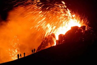 Volcanic eruption in Iceland, fast flowing lava, emergency declared