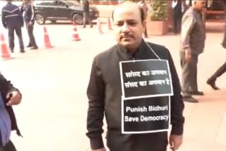 MP Danash Ali was seen protesting during the winter session with a placard hanging around his neck.