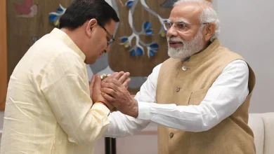 cm dhami pm modi